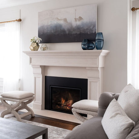 Omega 1111.511 GS Cast Stone Fireplace Mantel Surround in a bright and airy living space