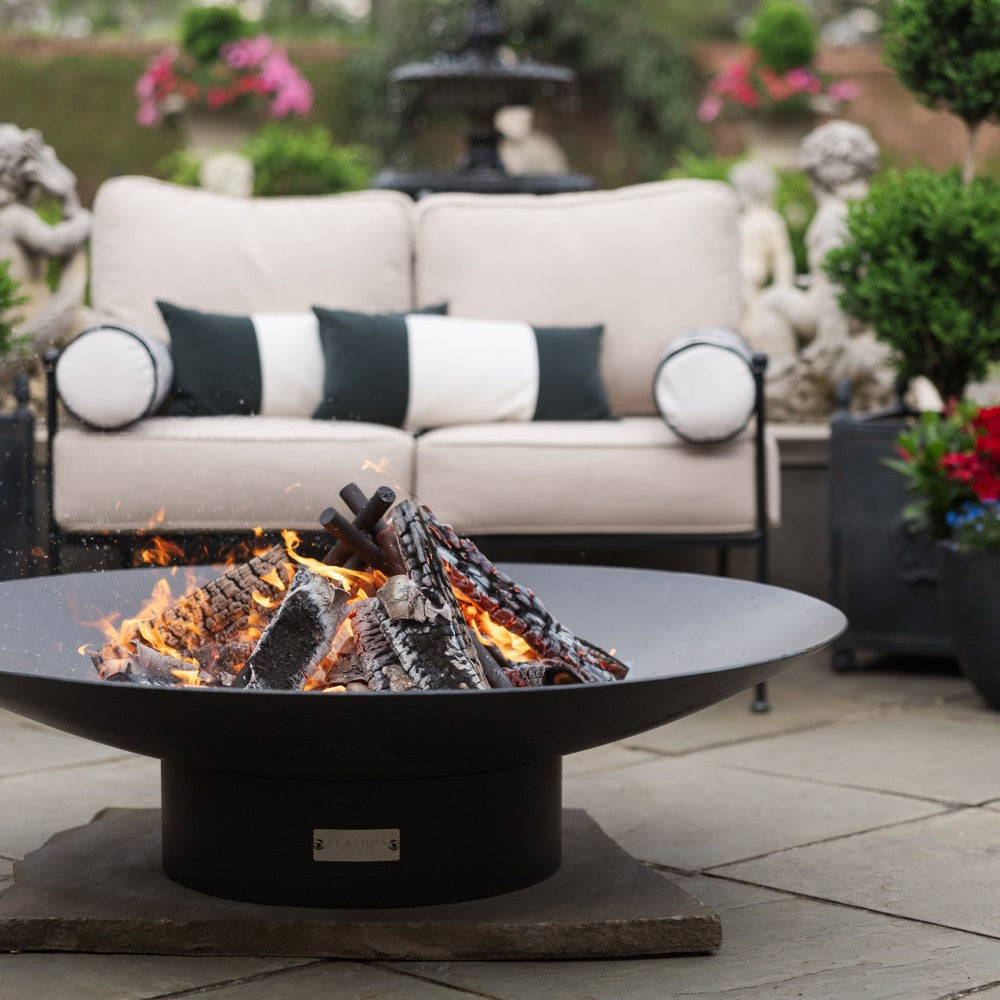 Seasons Fire Pits Concave Round Steel Fire Pit at Outdoor Place