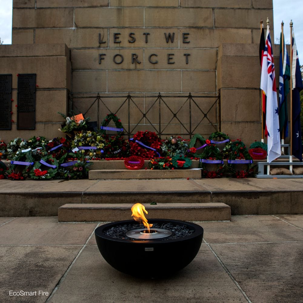 EcoSmart Fire Mix Round Concrete Ethanol Fire Bowl in a memorial