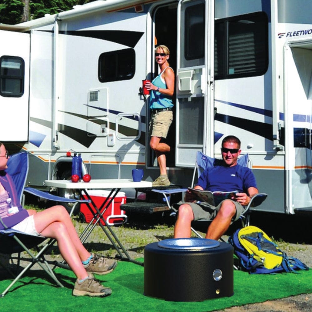 HPC Sport Pit 20-Inch Portable Gas Fire Pit beside a trailer van