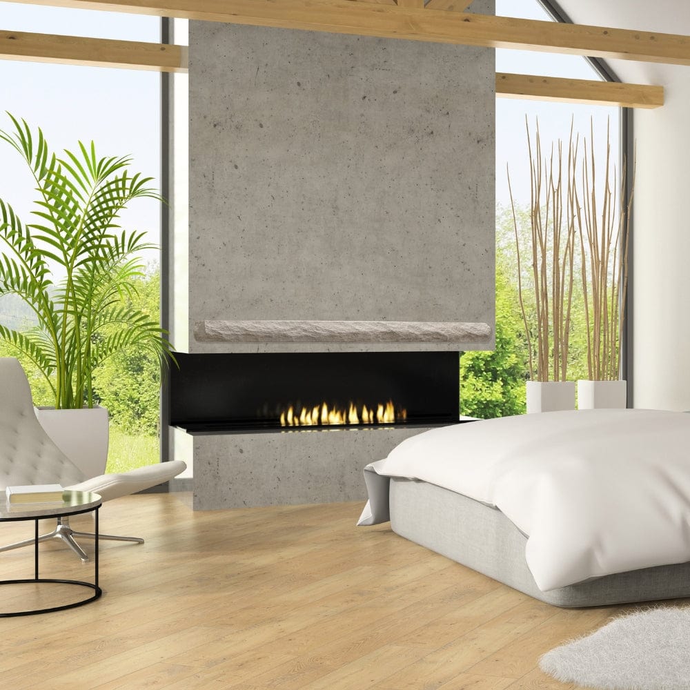 Lexington Hearth Rockface Concrete Mantel mounted on a bedroom wall