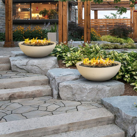 beige gas fire bowls placed near the steps for warm and inviting ambiance
