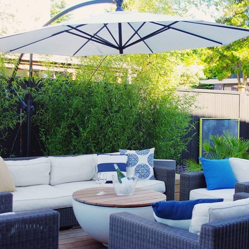 solus round hardwood tabletop with wine bottle on top