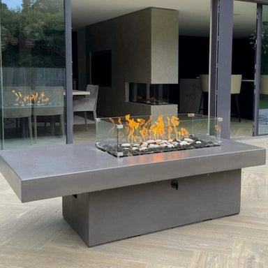 Solus Tavolo 68-Inch Linear Concrete Gas Fire Pit in a modern outdoor space