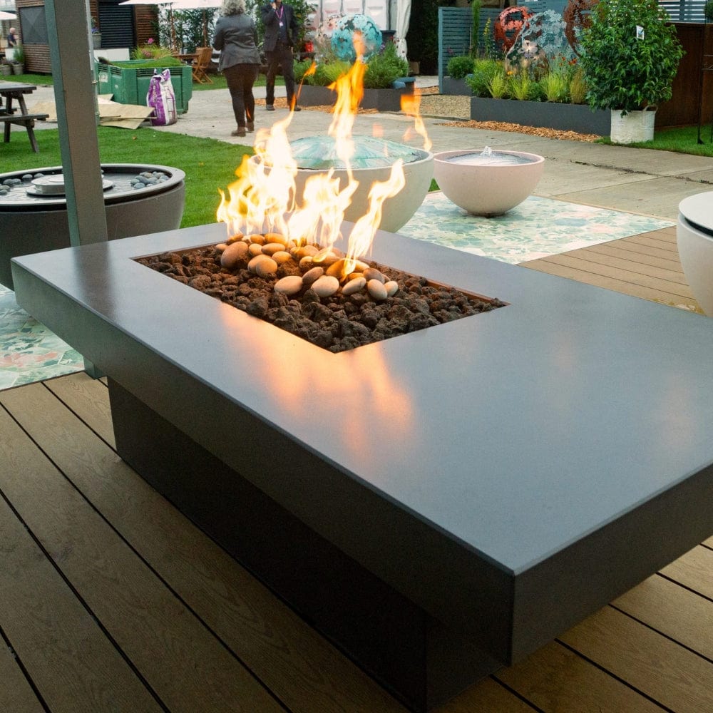 Solus Tavolo 68-Inch Linear Concrete Gas Fire Pit on a deck