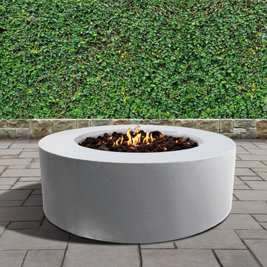 stonelum coliseo 1 round white gas fire pit in a garden