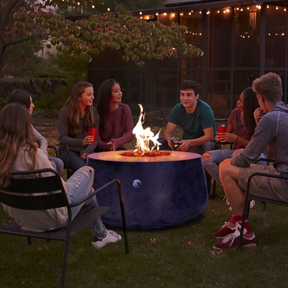 Gathering friends around the Stonelum Indiana 01 47-Inch Round Graphite Gas Fire Pit