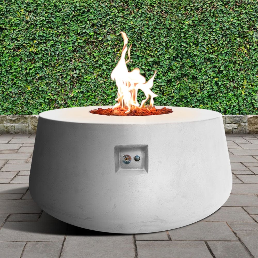 Stonelum Indiana 01 47-Inch Round White Gas Fire Pit in a garden