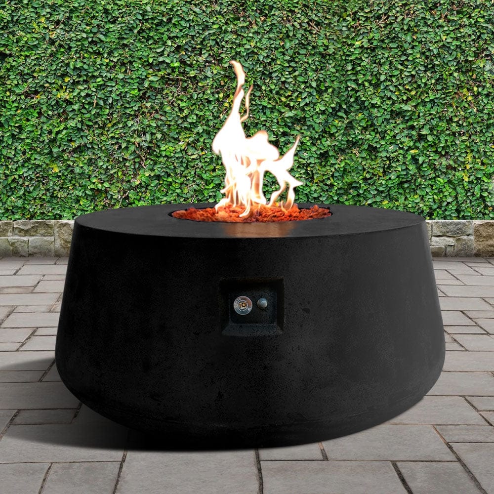 Stonelum Indiana 01 47-Inch Round Black Gas Fire Pit in a garden