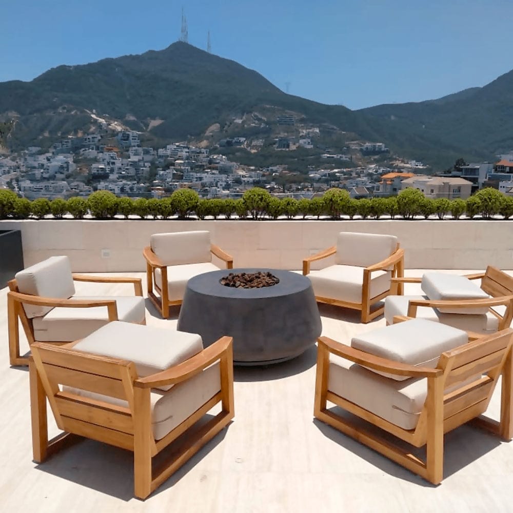 Stonelum Indiana 01 47-Inch Round Graphite Gas Fire Pit on a rooftop