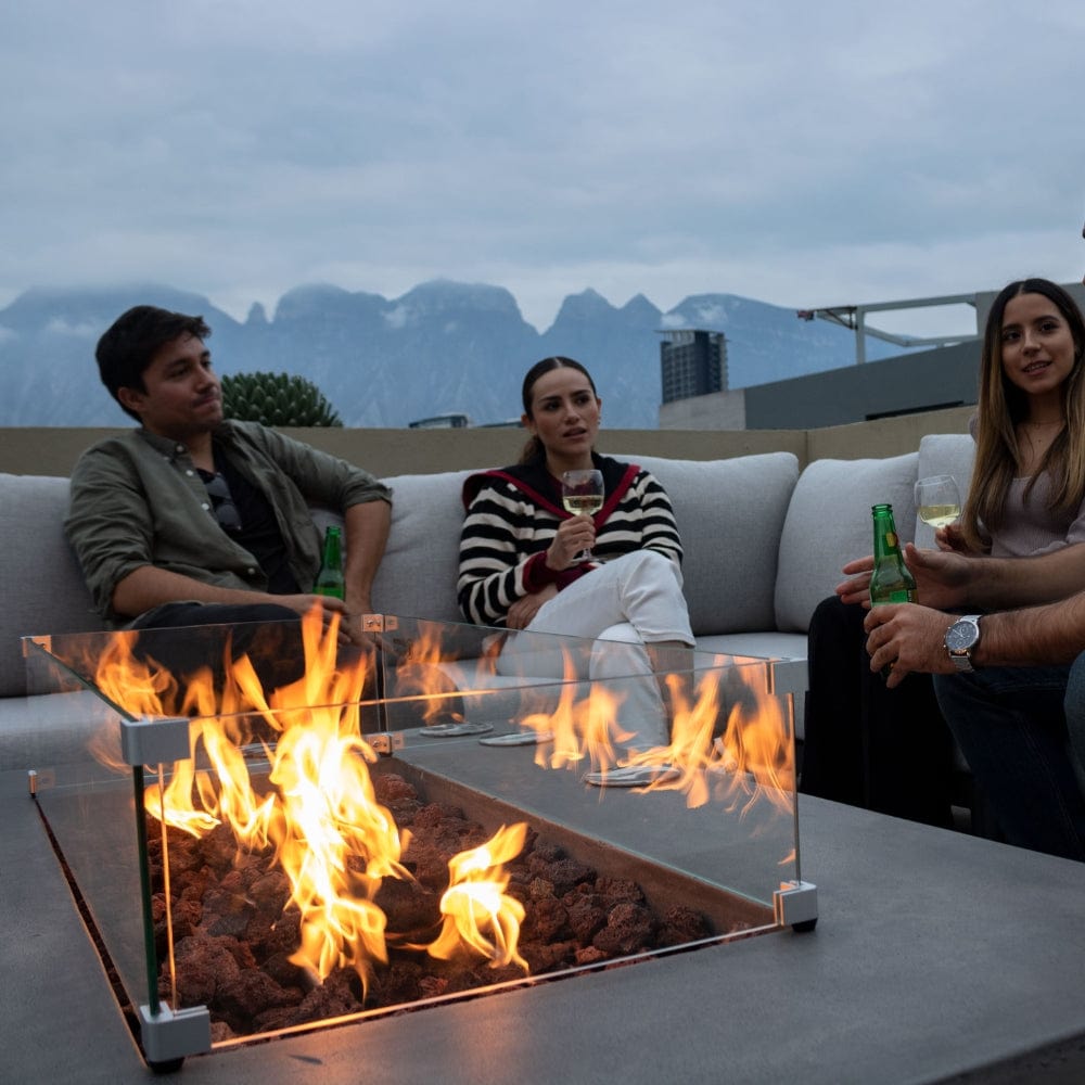 Having a drink by the Stonelum Manhattan 01 Rectangular Graphite Fire Pit