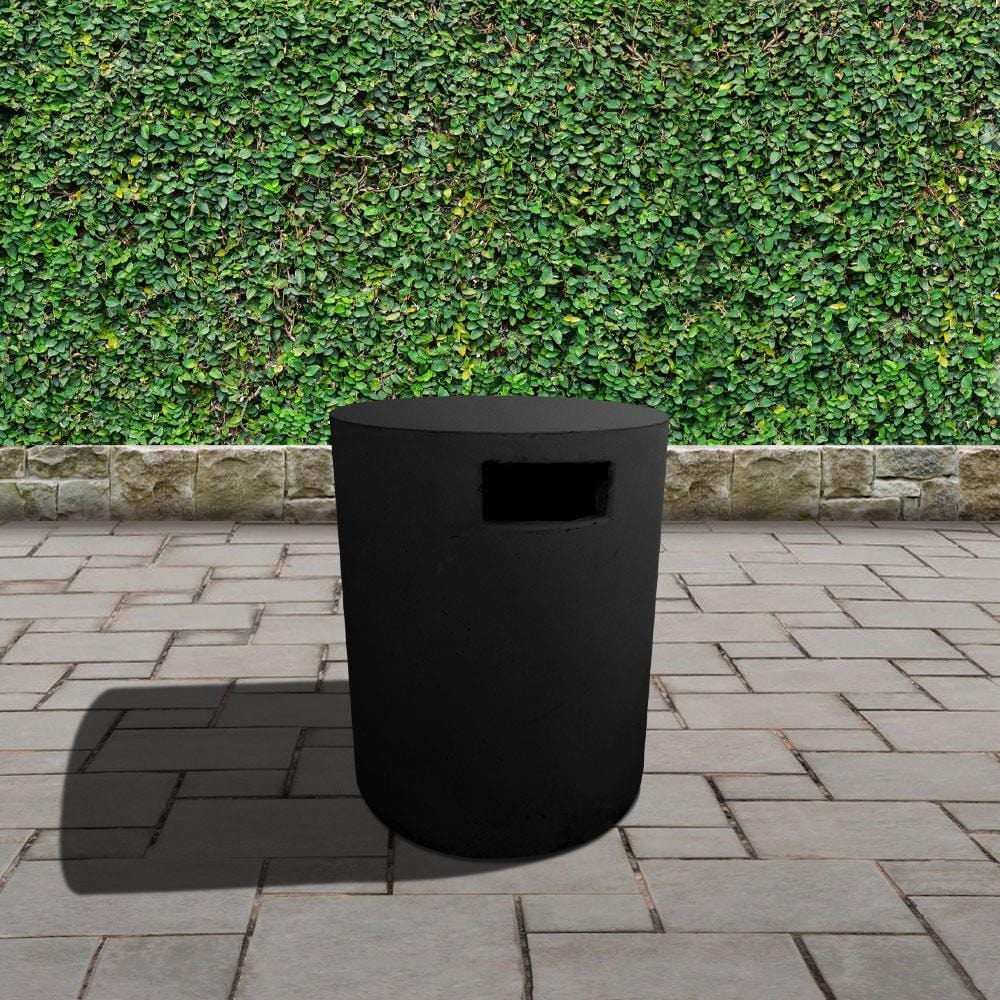 round black tank cover in garden