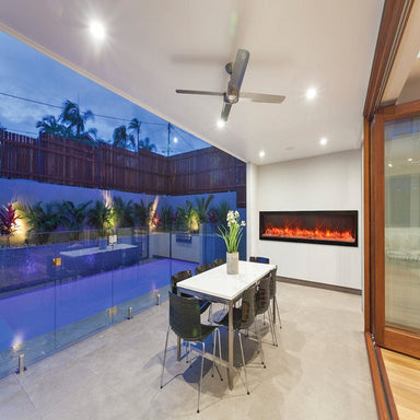 Amantii Panorama SLIM 88-Inch Built-in Indoor /Outdoor Electric Fireplace (BI-88-SLIM) by the pool