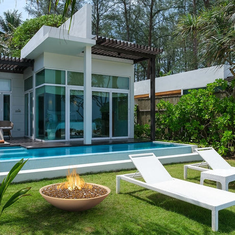 American Fyre Designs Marseille Cafe Blanco Fire Bowl in the garden