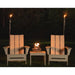 Anywhere Fireplace 65-Inch Polished Stainless Steel Rectangular Torches Behind Chairs