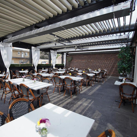 Calcana Standard Output 20' Stainless Steel Gas Patio Heater in Outdoor Dining Area