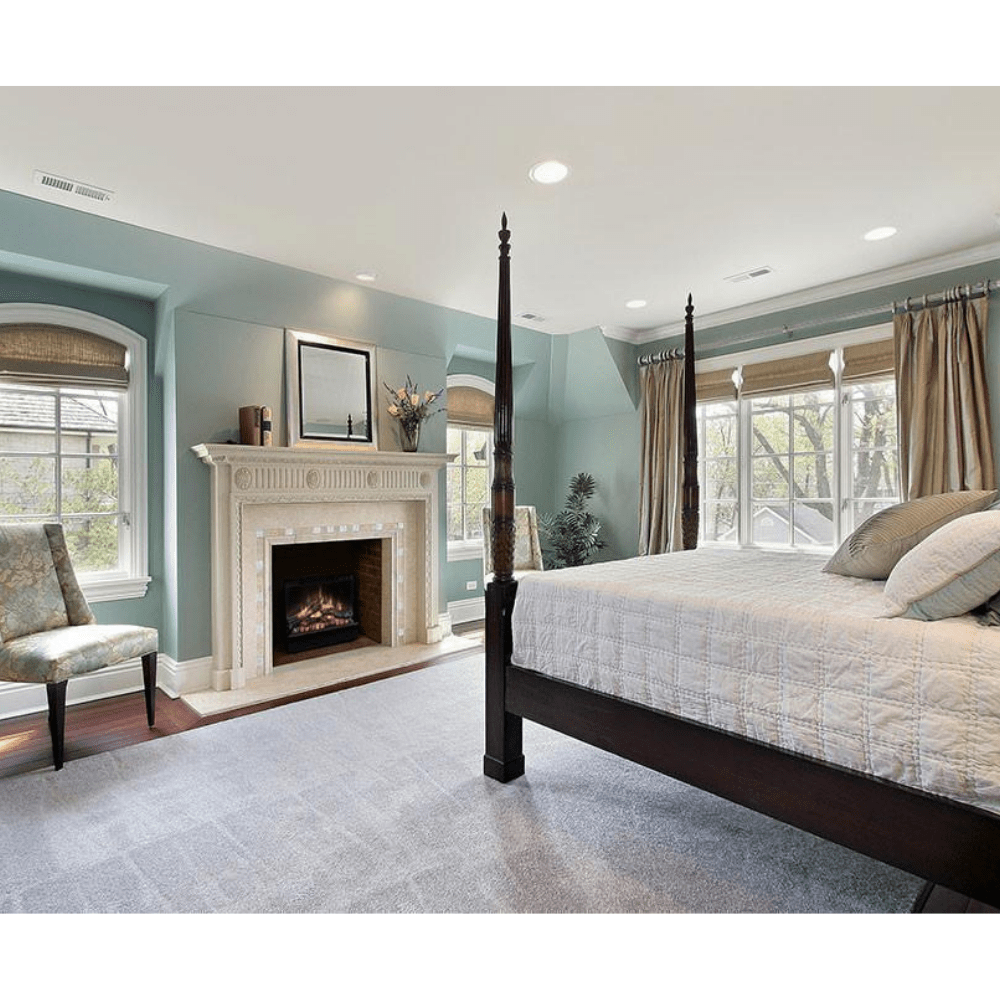 Dimplex 23-Inch Deluxe Insert Electric Firebox with White Surround in Bedroom