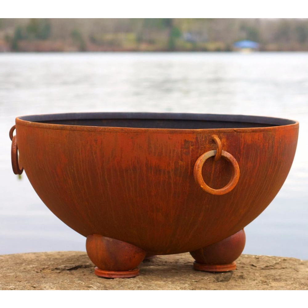 Fire Pit Art Nepal - 41" Handcrafted Carbon Steel Fire Pit (NP) Beside A Lake