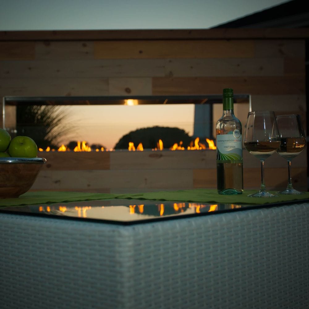 enjoying wine with the firegear kalea bay vent free outdoor gas fireplace