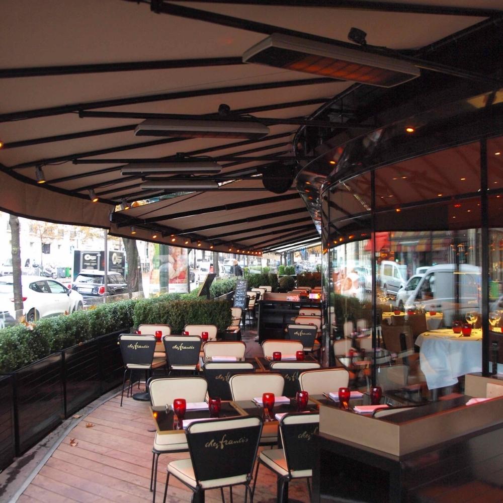 Heatscope Spot 35" Black Electric Heaters in Restaurant