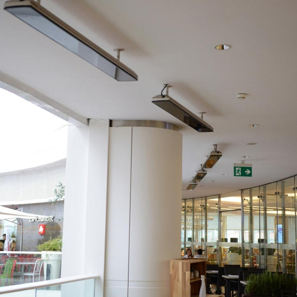 Heatscope Vision 65" Black Electric Heaters in Restaurant Dining Area