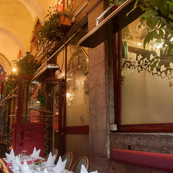 Heatscope Vision 65" Black Electric Heaters in Restaurant Dining Area