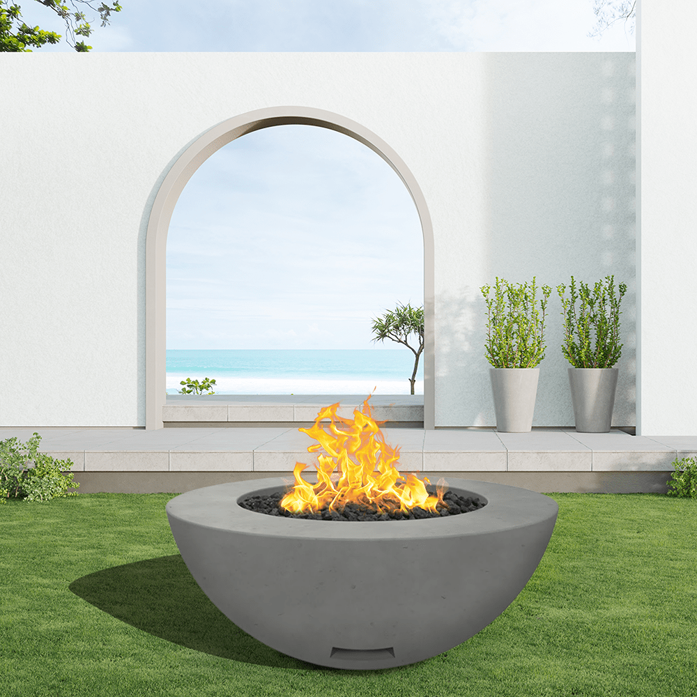 modern blaze round slate fire bowl with smooth surface in a light outdoor setting