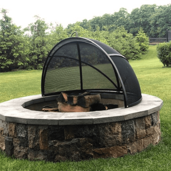 Modern Blaze Round Pivot Steel Screen on Fire Pit in outdoor area