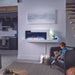 a kid and his dog feeling cozy near the napoleon stylus cara elite electric fireplace