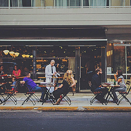 NDUSTRIA NEL Electric Patio Heater at an outdoor cafe