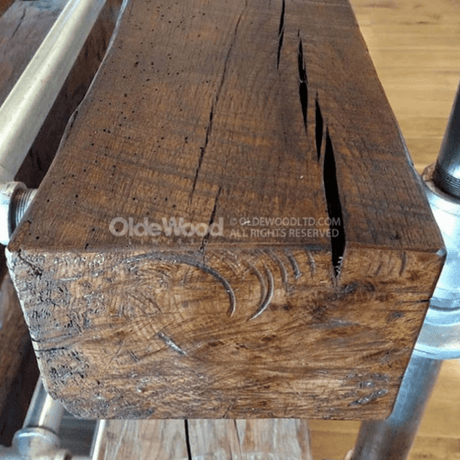 authentic marks on olde wood rough sawn wooden fireplace mantel