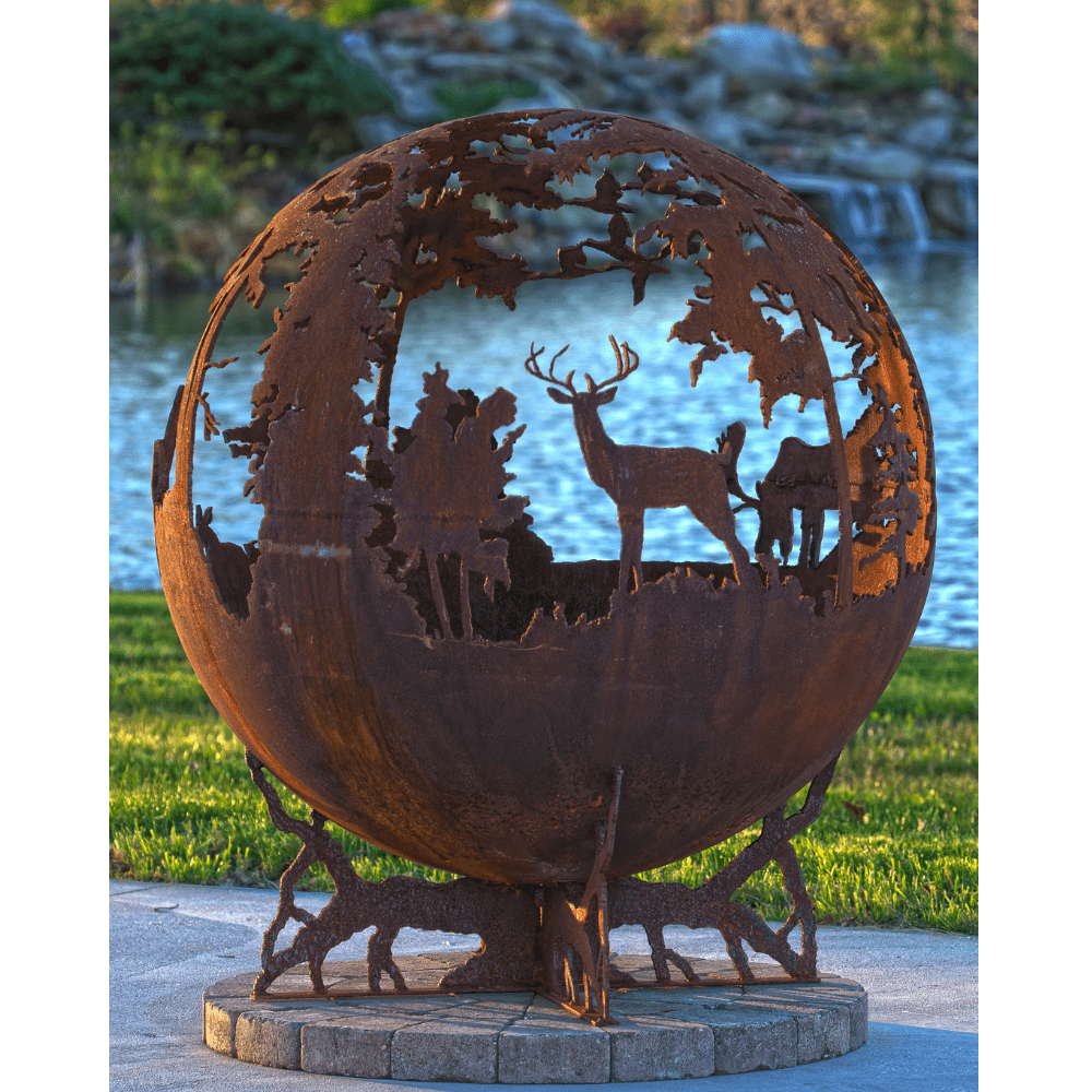 The Fire Pit Gallery Up North Steel Fire Pit with handcrafted art during the day