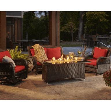 The Outdoor GreatRoom Company Balsam Montego 59" Linear Gas Fire Pit Table at night