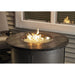 The Outdoor GreatRoom Company Edison 39-inch Round Gas Fire Pit Table lit up