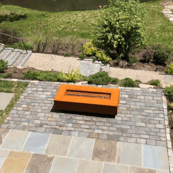 top fires coronado corten steel fire pit in yard