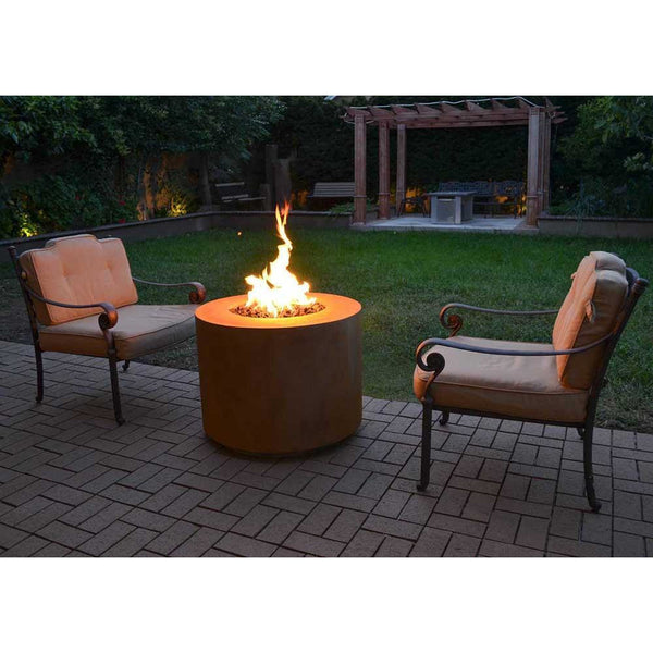 Top Fires Round Corten Steel Fire Pit in outdoor patio