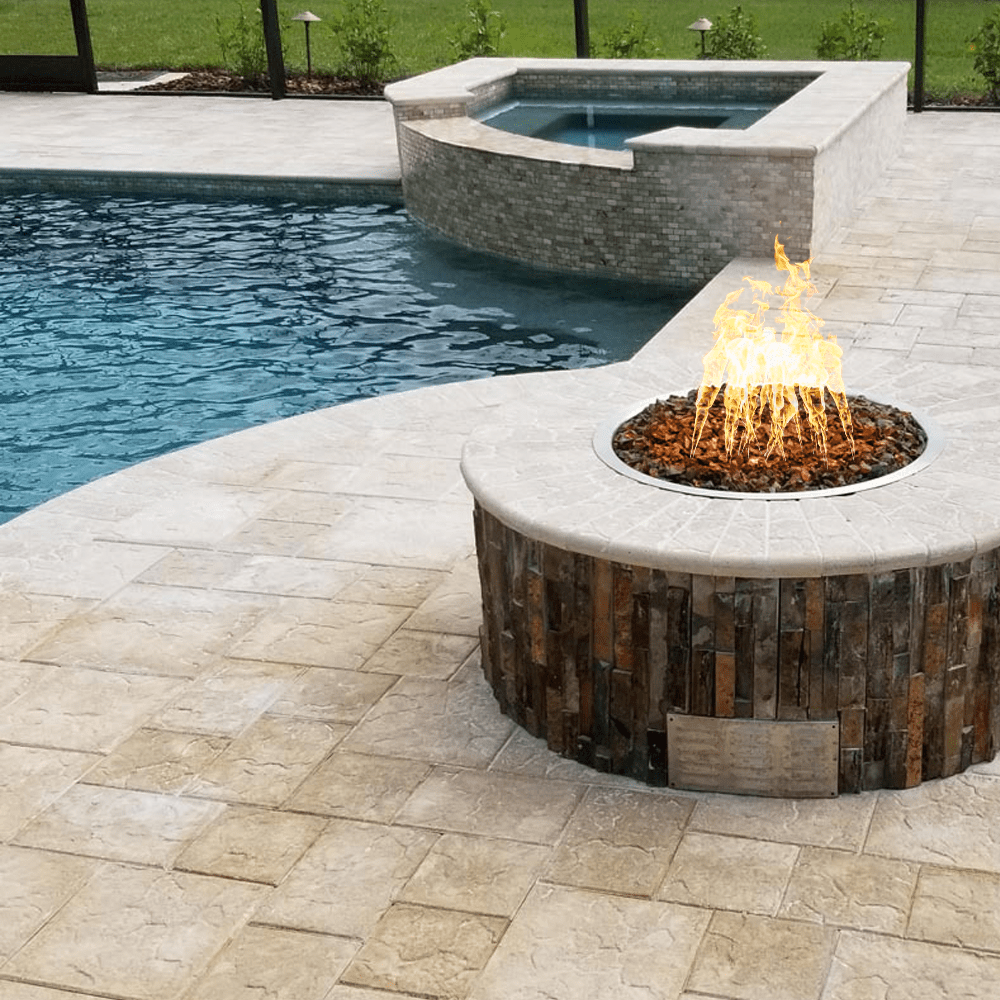 Top Fires Triple "S" Bullet Gas Burner in fire pit near pool area