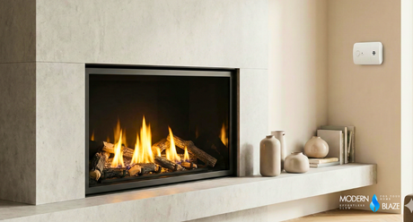 High-efficiency direct vent gas fireplace with a clean flame and visible carbon monoxide alarm, representing gas fireplace safety, maintenance, and compliance codes.
