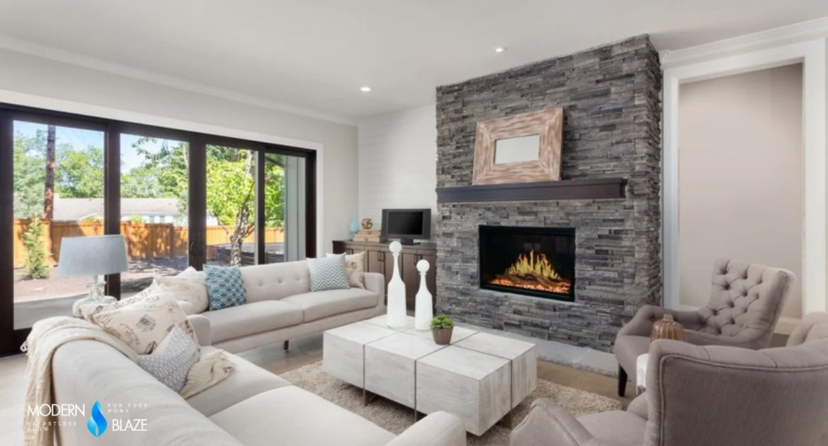 Large open living room with a lit stone fireplace, the kind of space a BTU calculation sizes