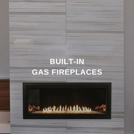 Built-in gas fireplace recessed into a marble wall in a modern living room