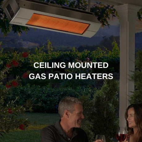 Sunpak stainless steel gas patio heater mounted overhead under a pergola, glowing above an outdoor dining table at dusk