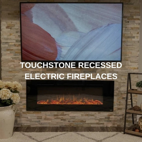Touchstone recessed electric fireplace built into a stacked stone wall with the flame lit
