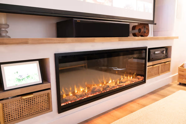 Modern living room with electric fireplace, TV, and soundbar.