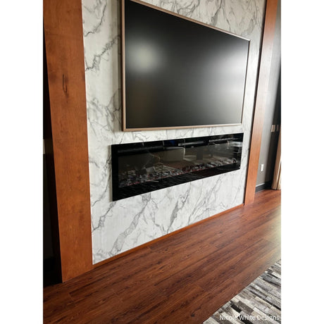 Touchstone Sideline 84-Inch recessed electric fireplace installed in a room
