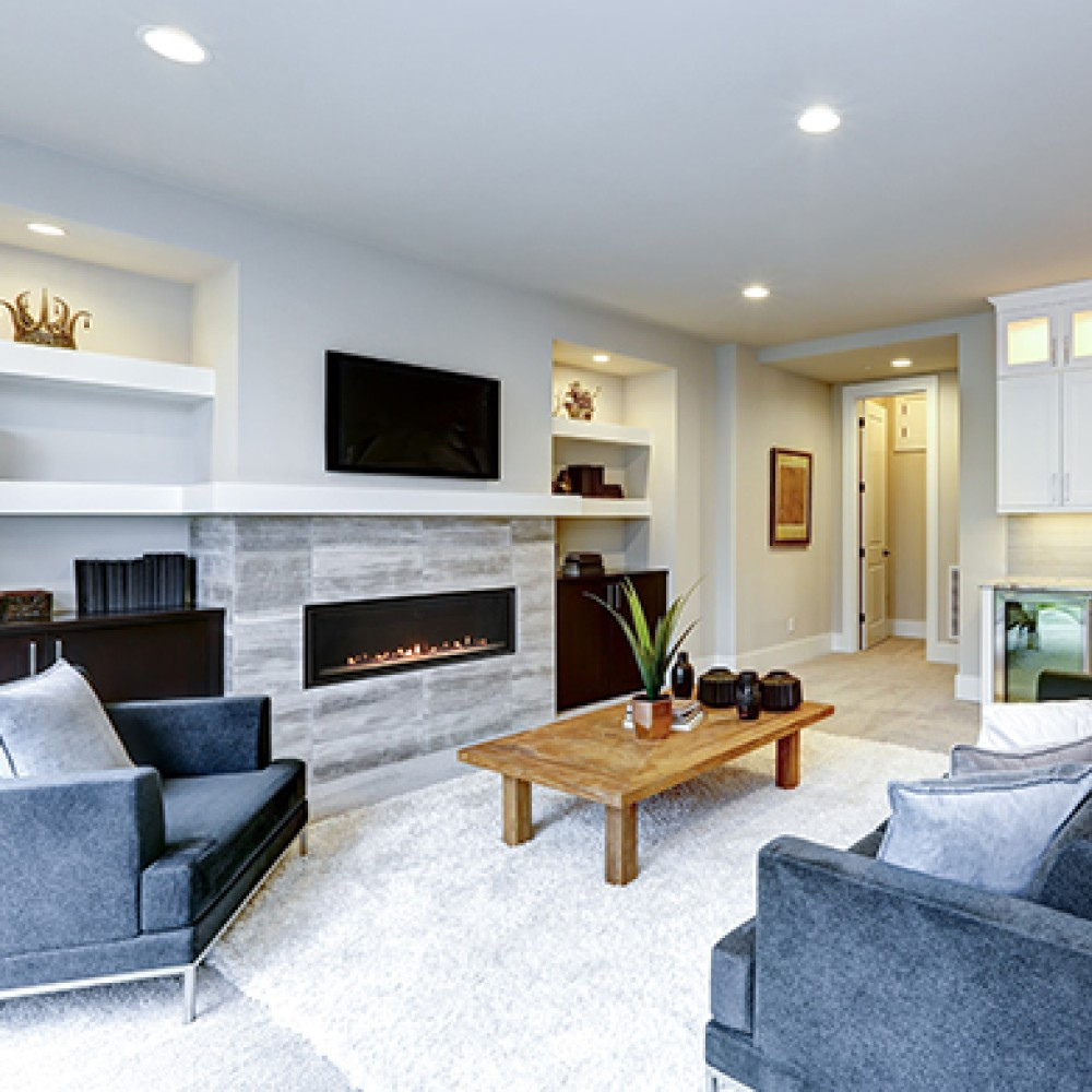 Empire Loft 46-Inch Linear Direct Vent Gas Fireplace under Mantel at Living Room