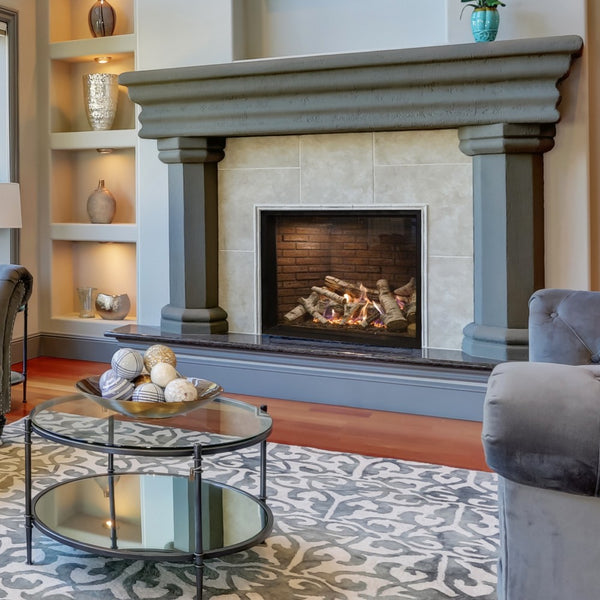 Empire Rushmore Traditional Direct Vent Gas Fireplace with Birch Logs in Room Scene