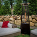 Paragon Outdoor Inferno Flame Tower Patio Heater beside a couch