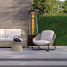 Paragon Outdoor Inferno Flame Tower Patio Heater in Hammered Bronze in an outdoor space