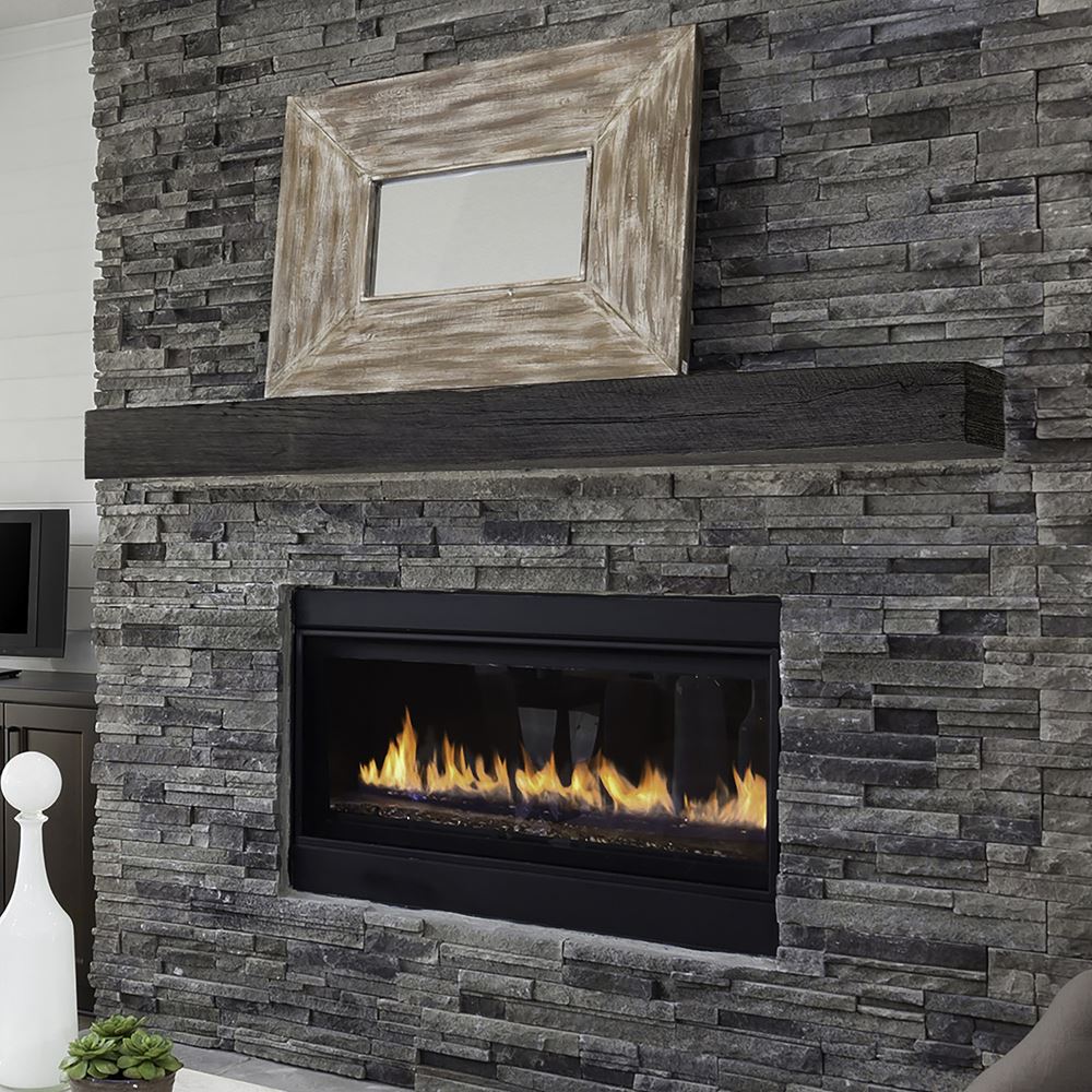grist mill mantel on a gray stone wall