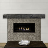 half round sleeper eclipse mantel on a shiplap wall